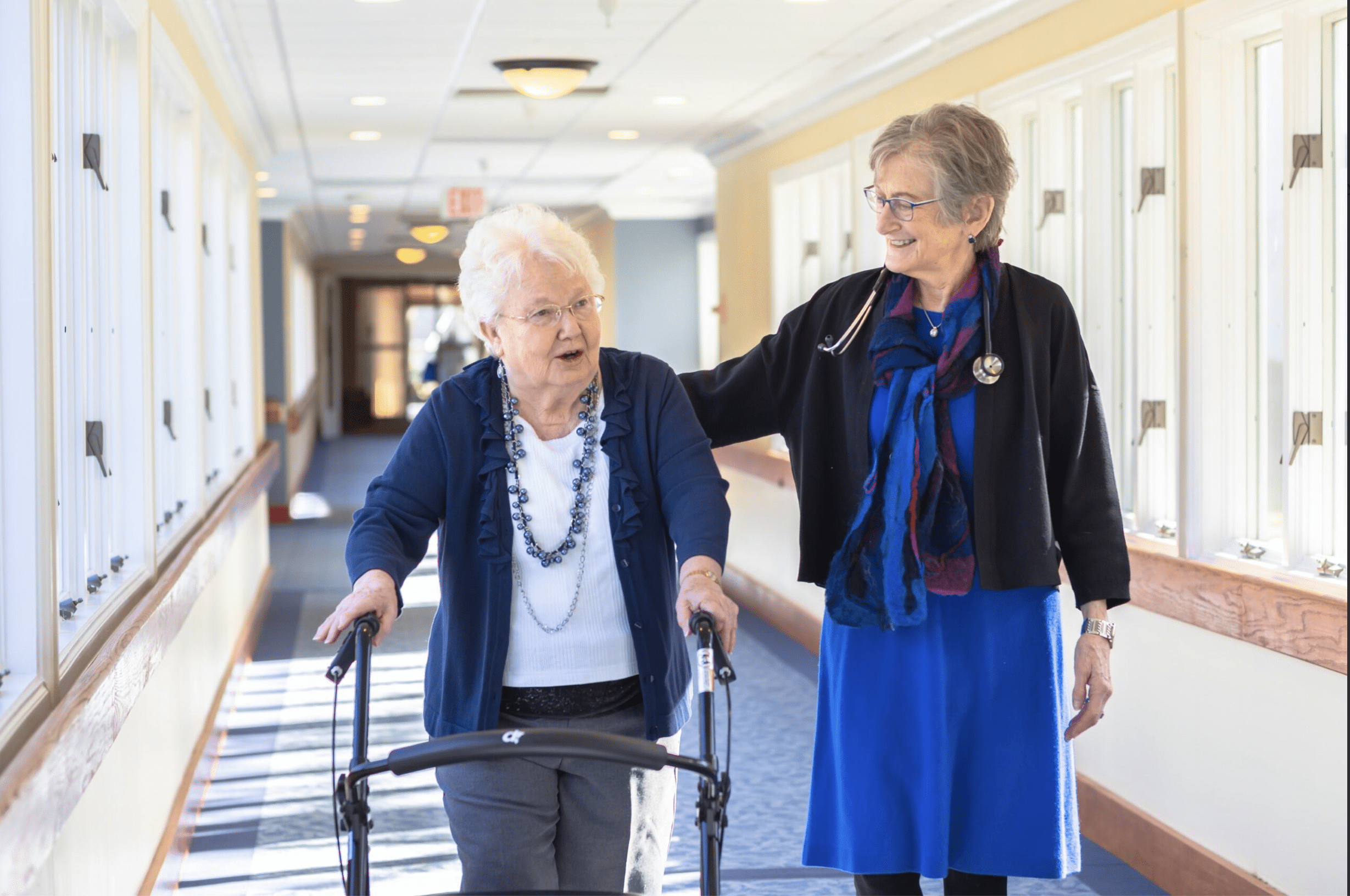 A nurse helps a patient with flexibility